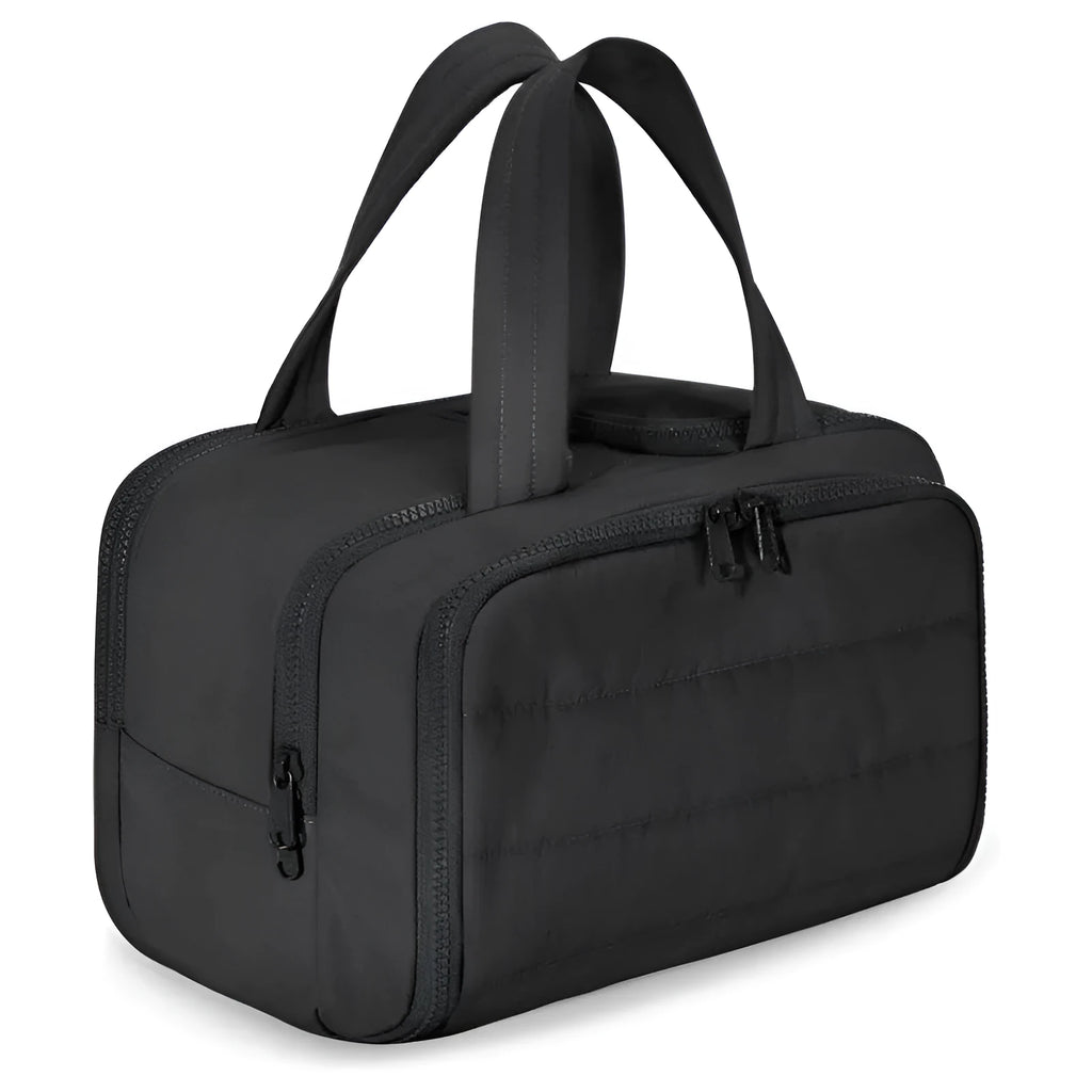 Large lightweight travel toiletry bag in beige with wide open design showing fluffy interior