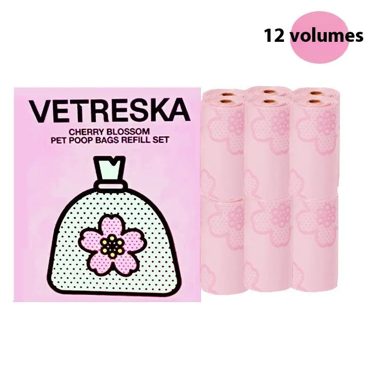 Dog poo bag dispenser capsule with scented refill roll in strawberry pattern design