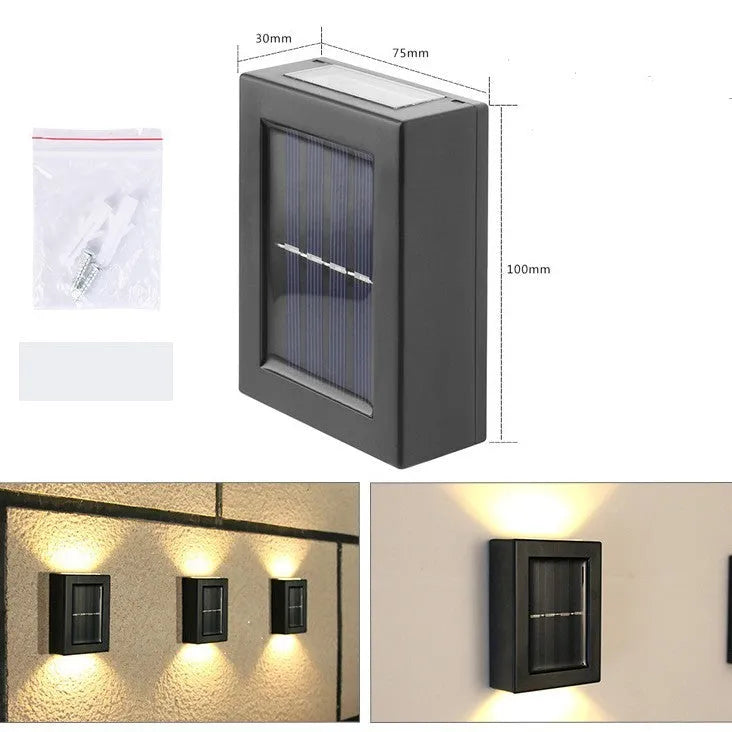 Solar garden wall light with LED illumination for outdoor decorative lighting