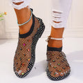 Women's flat sandals with mesh upper and colourful rhinestone decoration