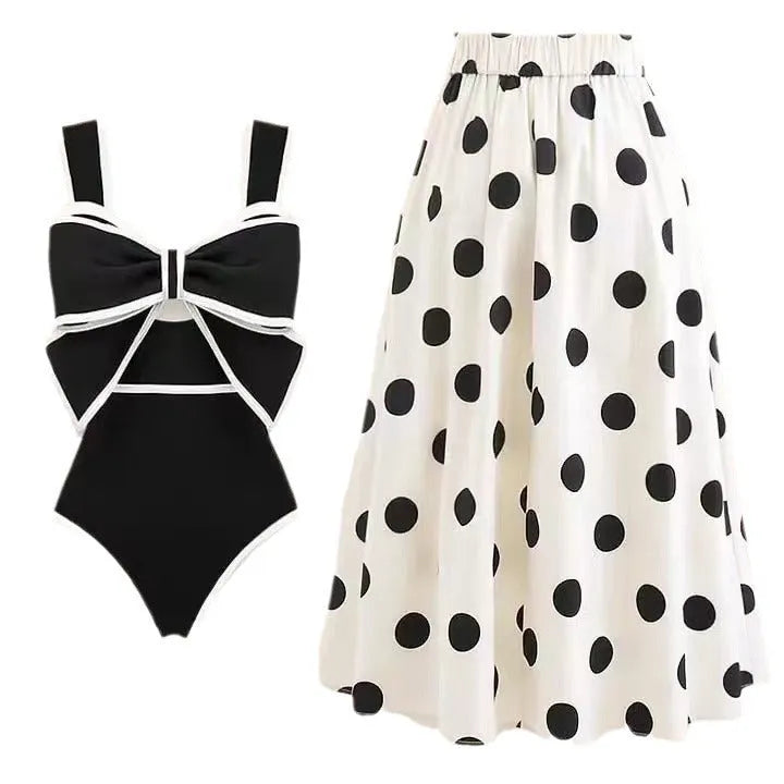 Women's one-piece swimsuit with beach dress style featuring bow detail and round skirt in polyester fabric