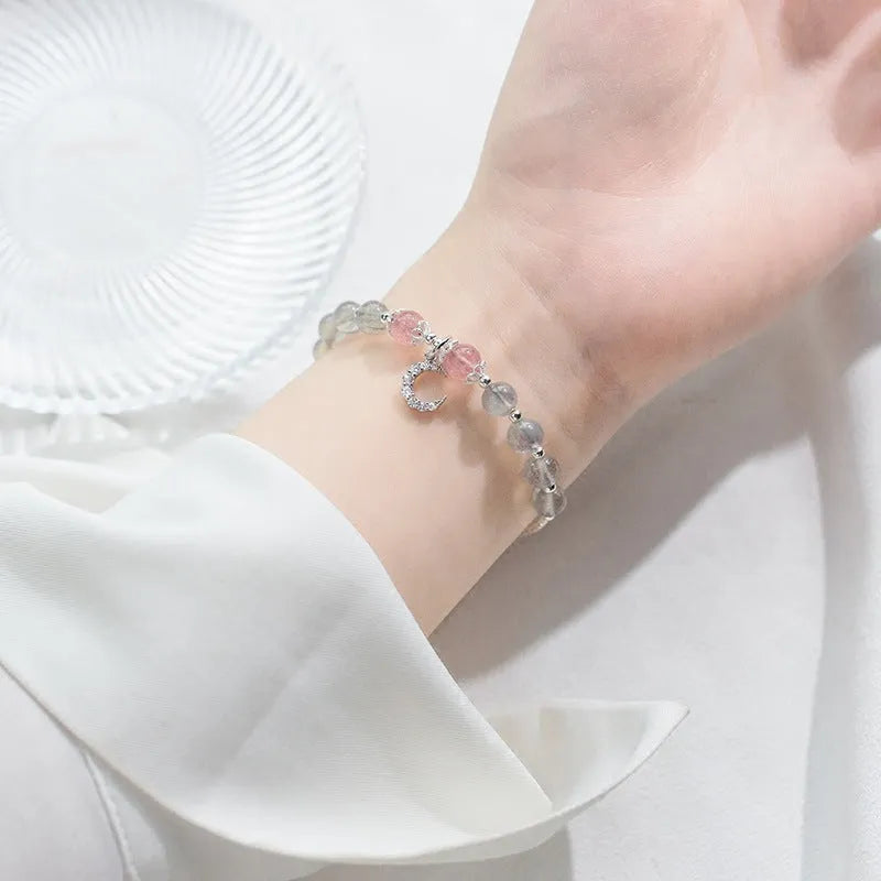 Natural moonstone adjustable bracelet with crescent moon charm showing 6mm bead and silver extension chain