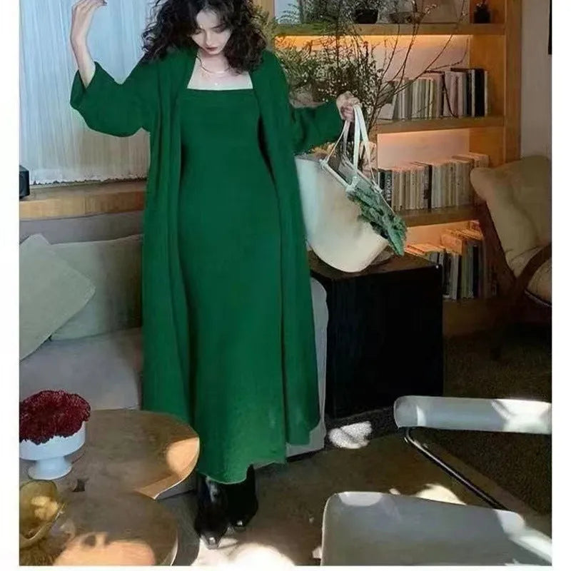 Women's grey knitted cardigan dress sweater suit two piece set with long skirt and regular sleeves.