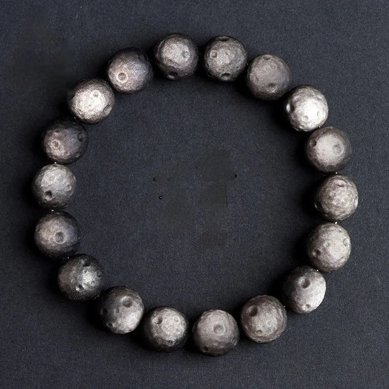 Obsidian crater ball bracelet with textured beads in silver stone or golden meteorite finish