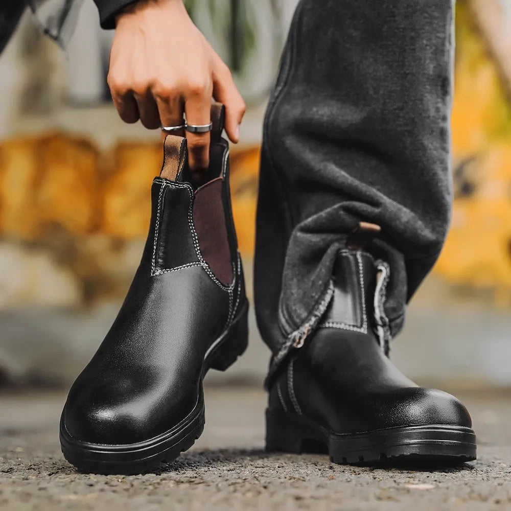 Vintage-style unisex Chelsea boot in frosted brown PU with car suture detail and a low horseshoe heel.