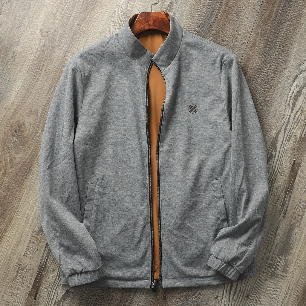 Men's simple stand collar casual jacket in polyester blend fabric, shown on a hanger.