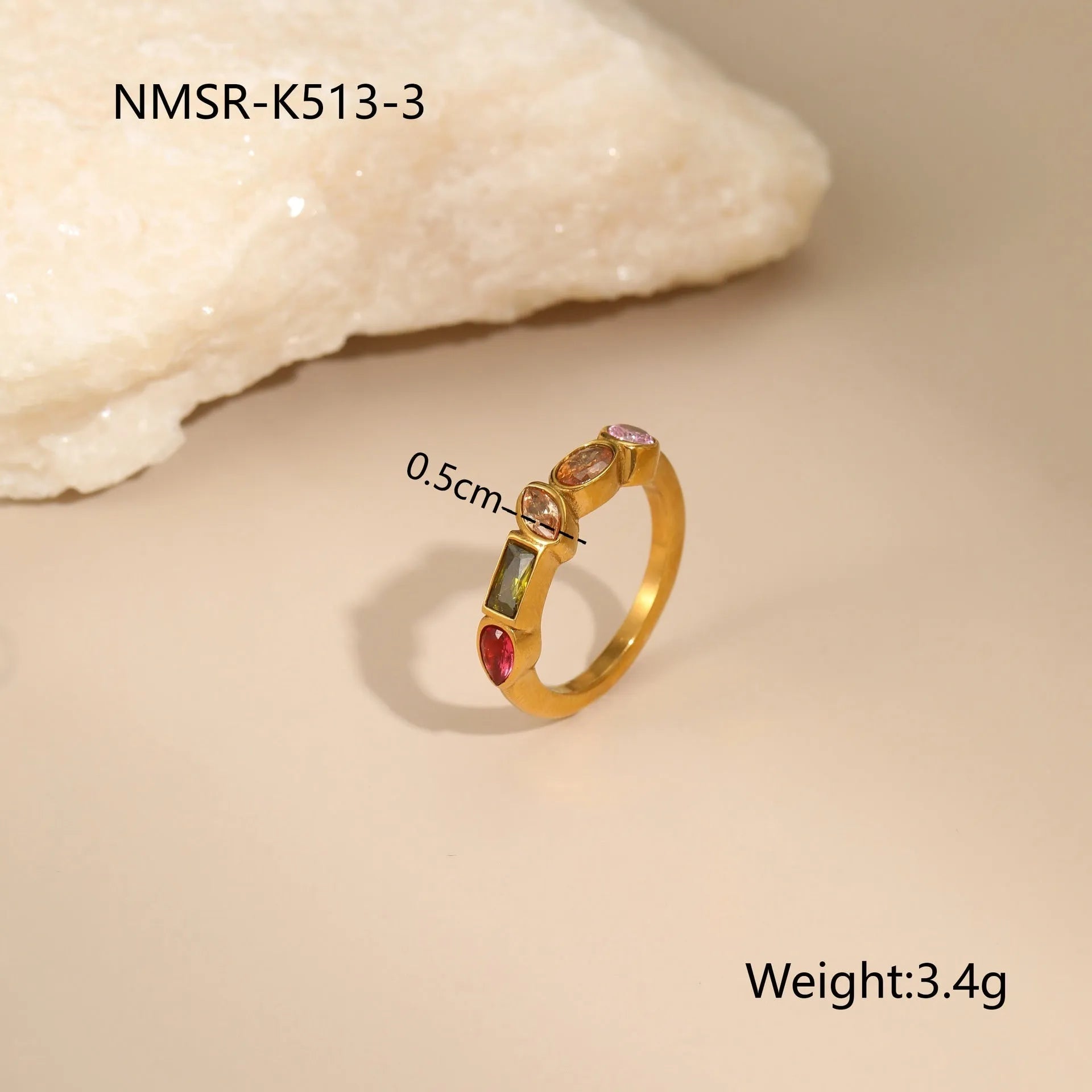 Geometric gold plated jewellery set showing necklace, ring, and earrings with chain-style design