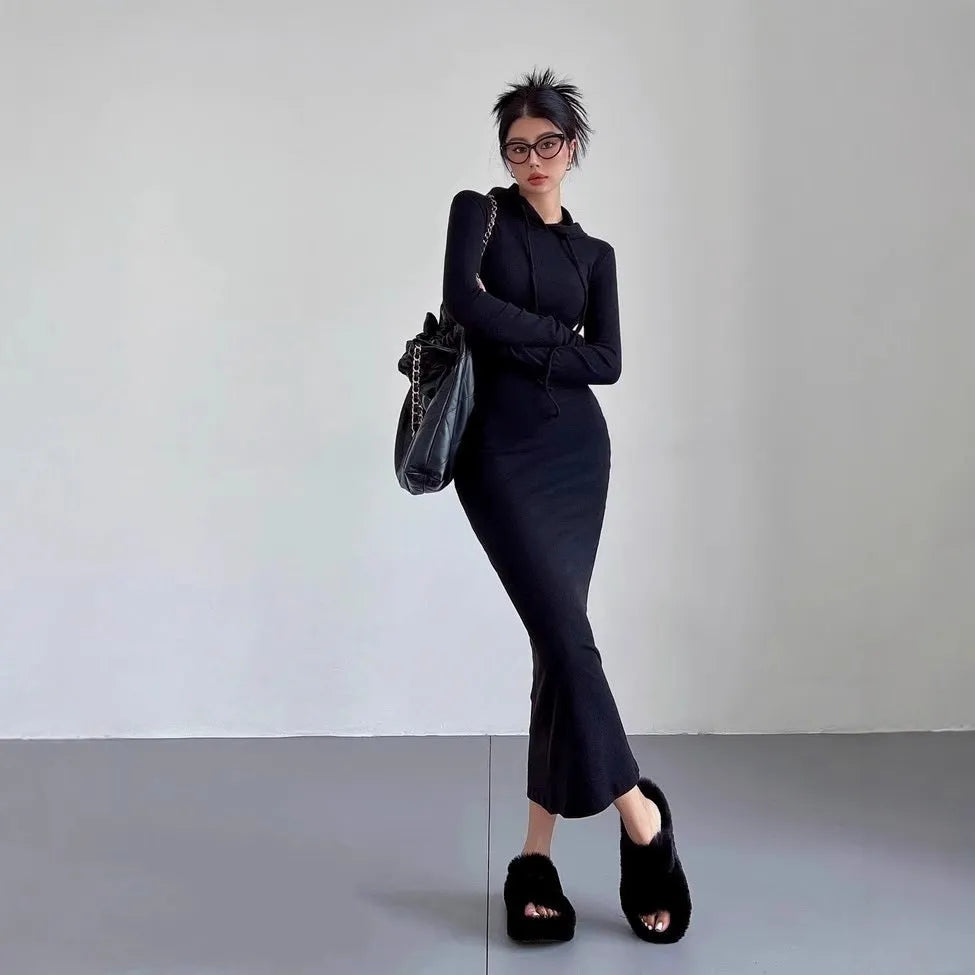 Women's grey polyester sheath dress with long sleeves and a high waist, knee-length.