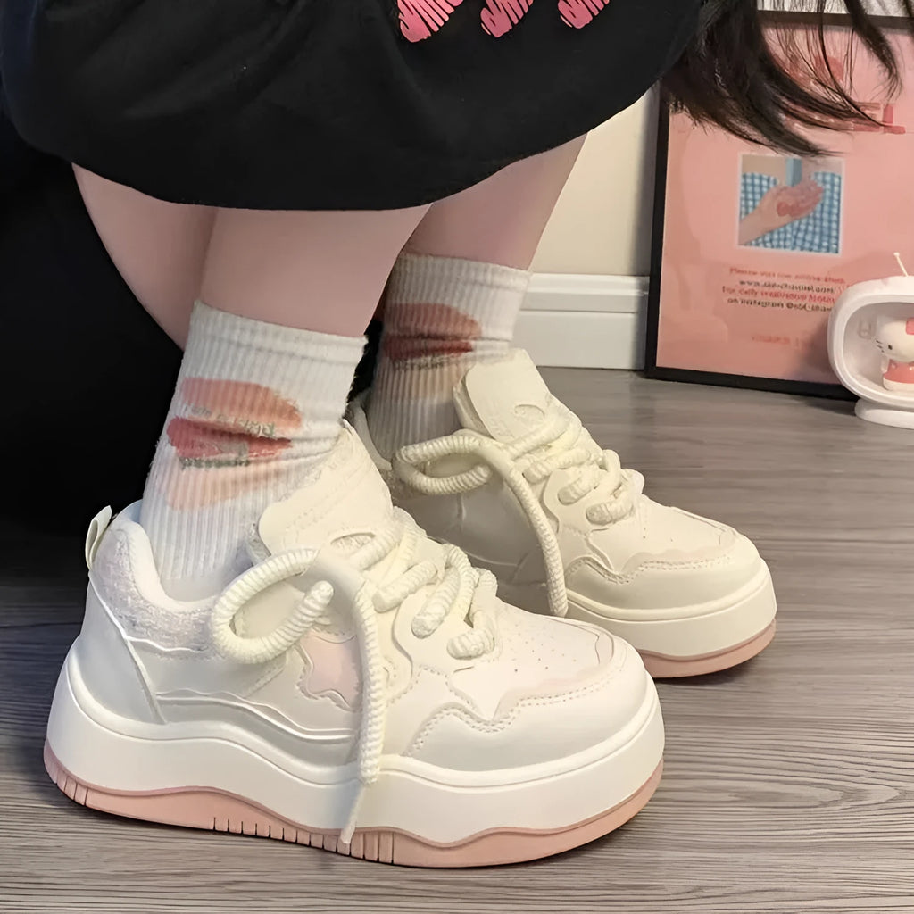 Women's green platform sneakers with patent leather details and rubber sole
