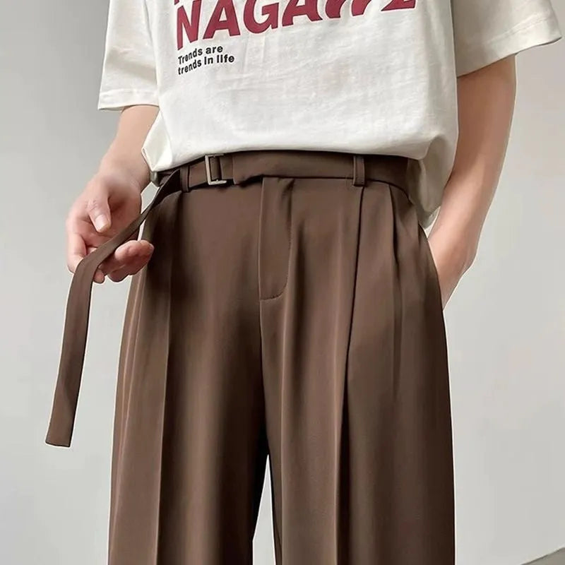 Black wide leg trousers with straight leg opening and non-ironing chemical fibre blend fabric