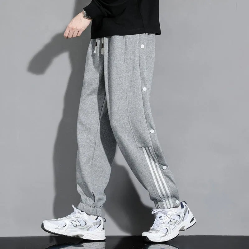 Men's loose ankle-tied autumn sweatpants in cotton blend fabric with high waist design