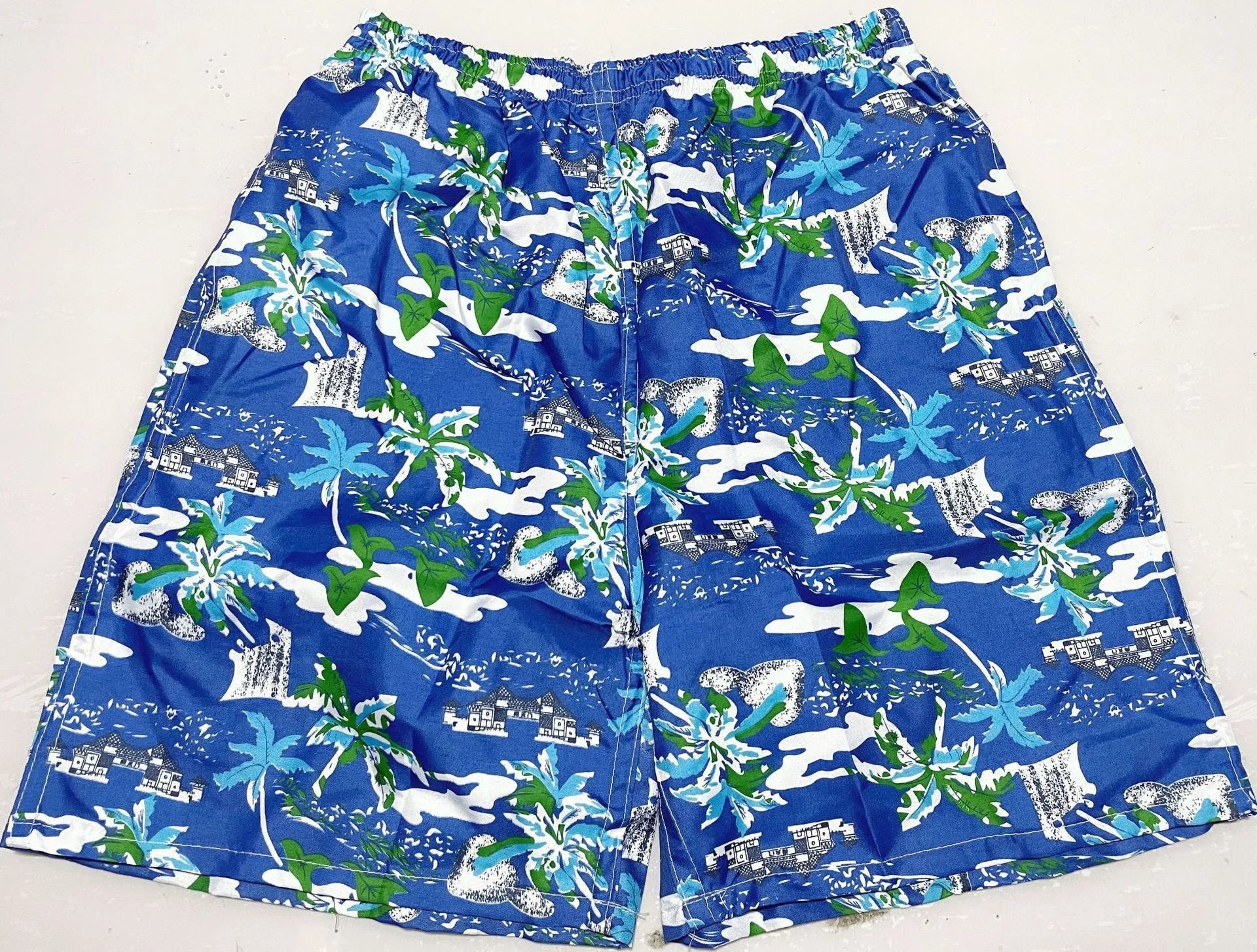 Men's floral printed five-point swimming trunks in free size made of polyester