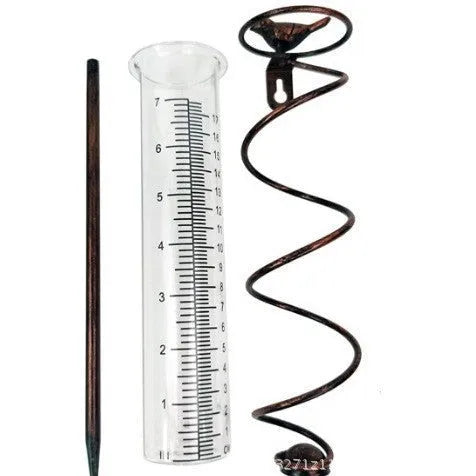 Traditional cast iron stand with bird-shaped glass rain gauge for garden precipitation measurement
