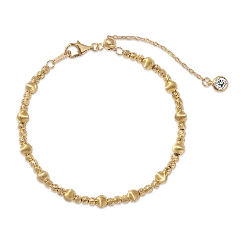 925 sterling silver cat's eye ball bracelet with carved links and brushed finish on white background