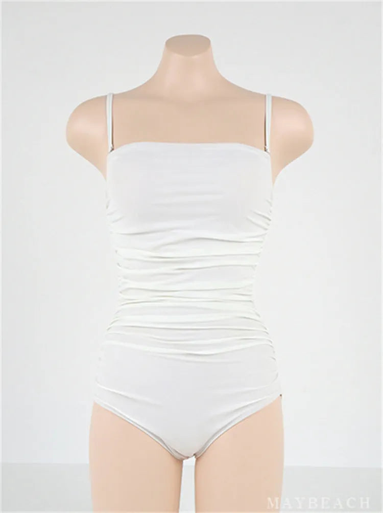 Sling style one-piece swimsuit with belly pleats in blue colour