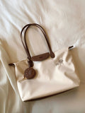 Large capacity Oxford cloth casual tote shoulder bag in pink with sandwich pocket and mobile phone compartment