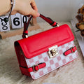 Retro square crossbody bag with ethnic floral stitch patterns and horizontal suitcase shape