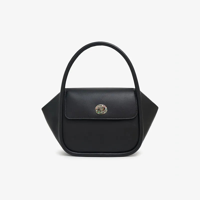Women's leather wing-shaped tote bag with hard handle and cross-body strap in four colour options
