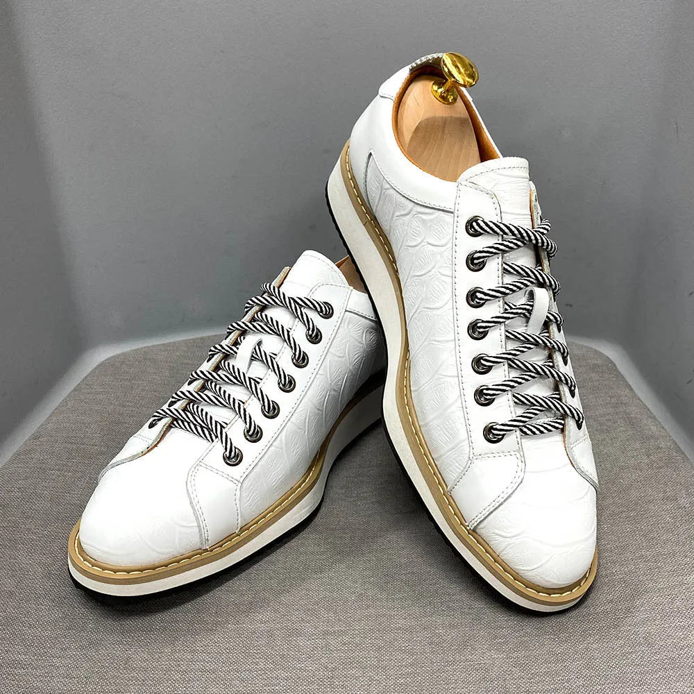 Men's embossed pattern canvas shoes with front tie closure in low tube height design