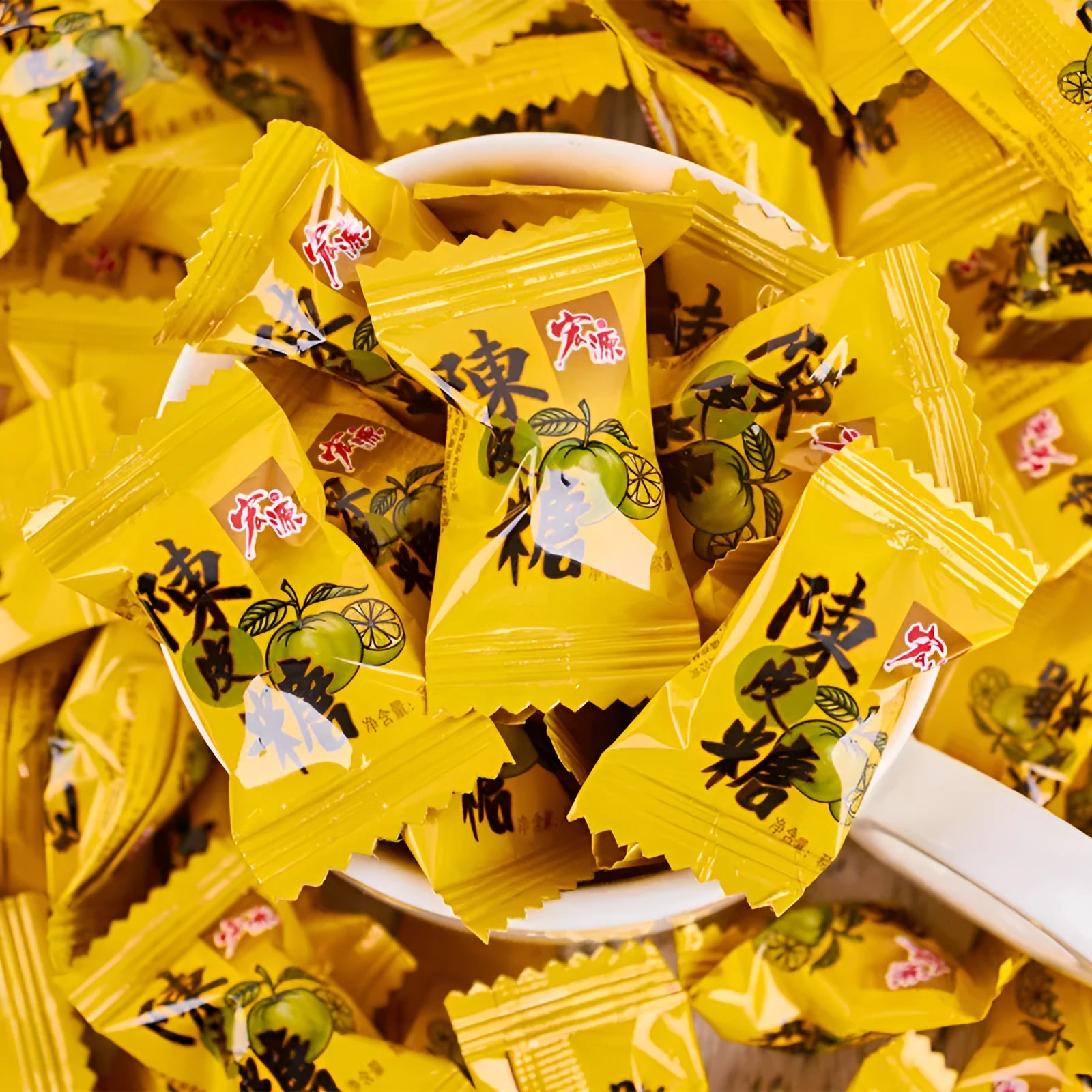 Bag containing separate packs of Plum Sugar, Guava, and Tangerine Peel flavoured hard candies.
