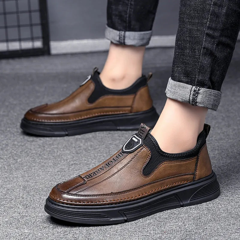 Men's black and brown leather casual shoes with round toe design on size display