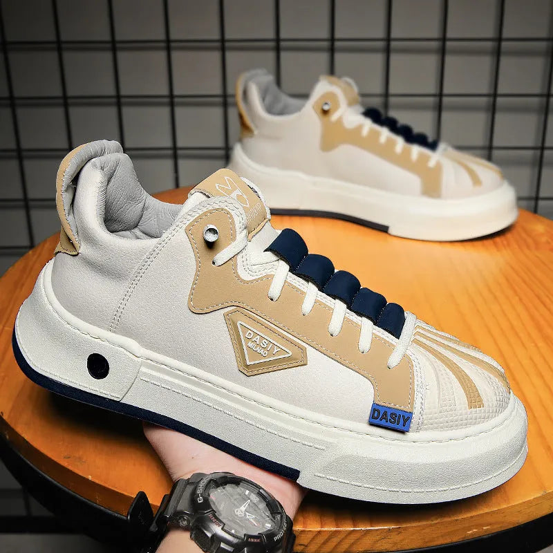 Men's beige low-top casual sneakers with elastic band fastening and leather stitching detail on microfiber upper.