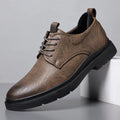 Men's black leather sneakers with decorative sewing lines and rubber sole shown in size 42