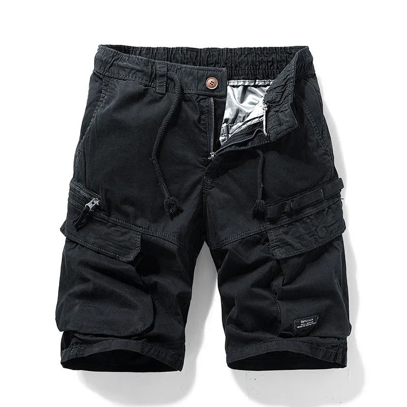 Men's army green cotton shorts with a zip fly and multiple pockets, shown in a Korean-style fifth pants length.