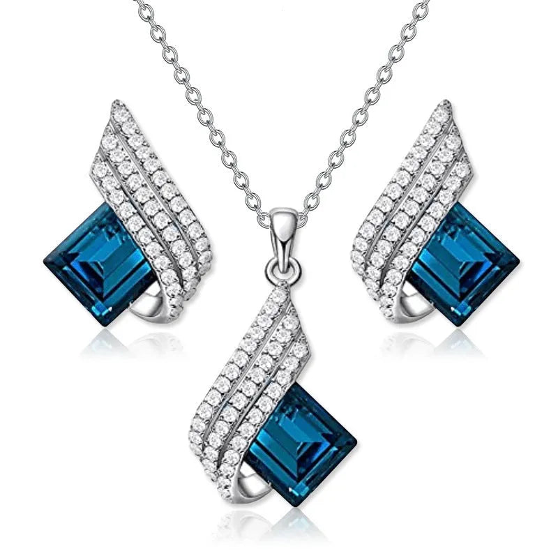 Women's alloy and glass cross chain necklace with matching electroplated ear studs set