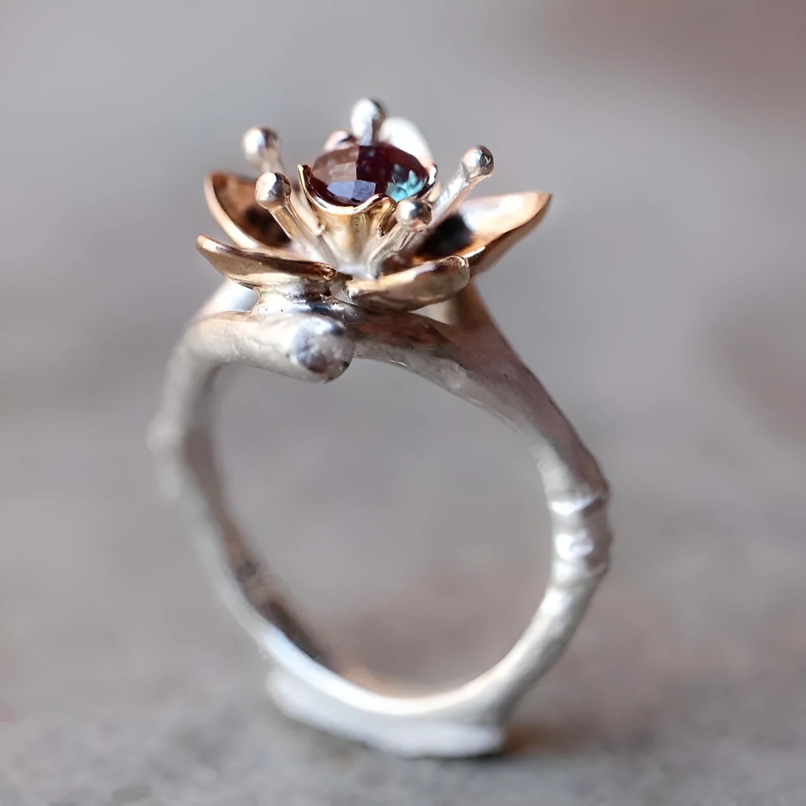 Silver two-tone alloy ring with floral and geometric design for women, showing UK size options.