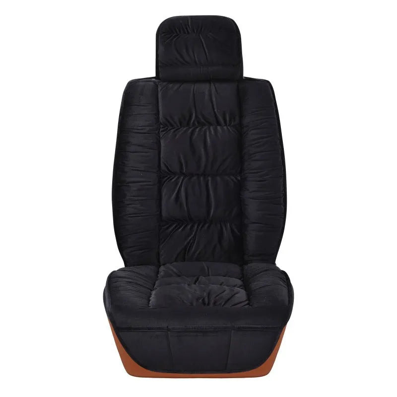 Short plush car seat cushion in charcoal grey on vehicle seat