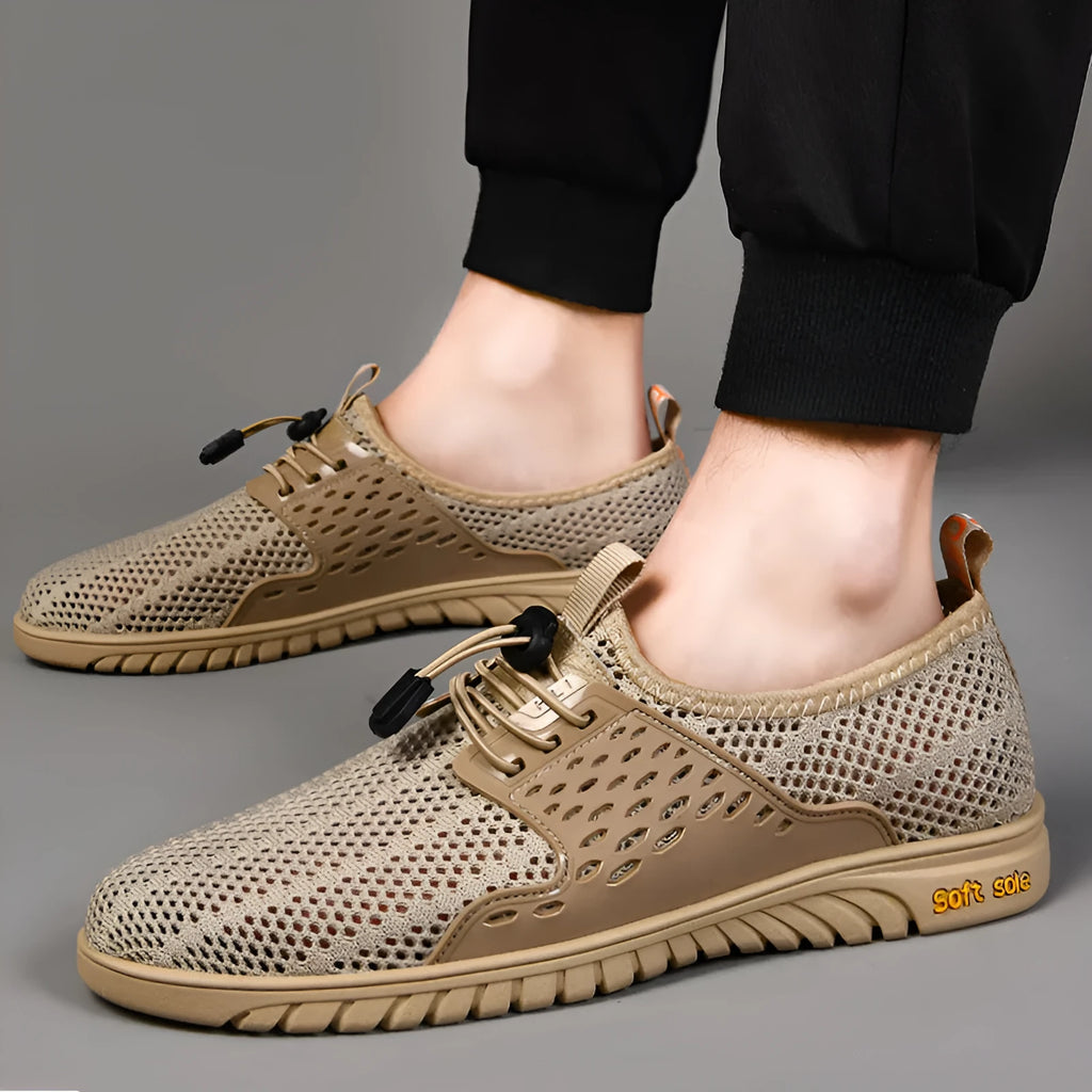 Men's black mesh casual shoes with elastic closure and round toe design