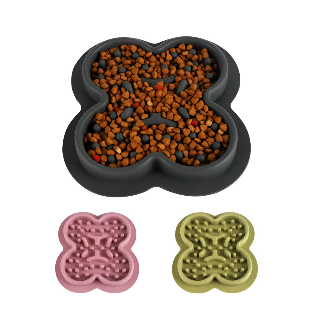 Silicone pet licking pad slow feeder mat in various colours on a flat surface