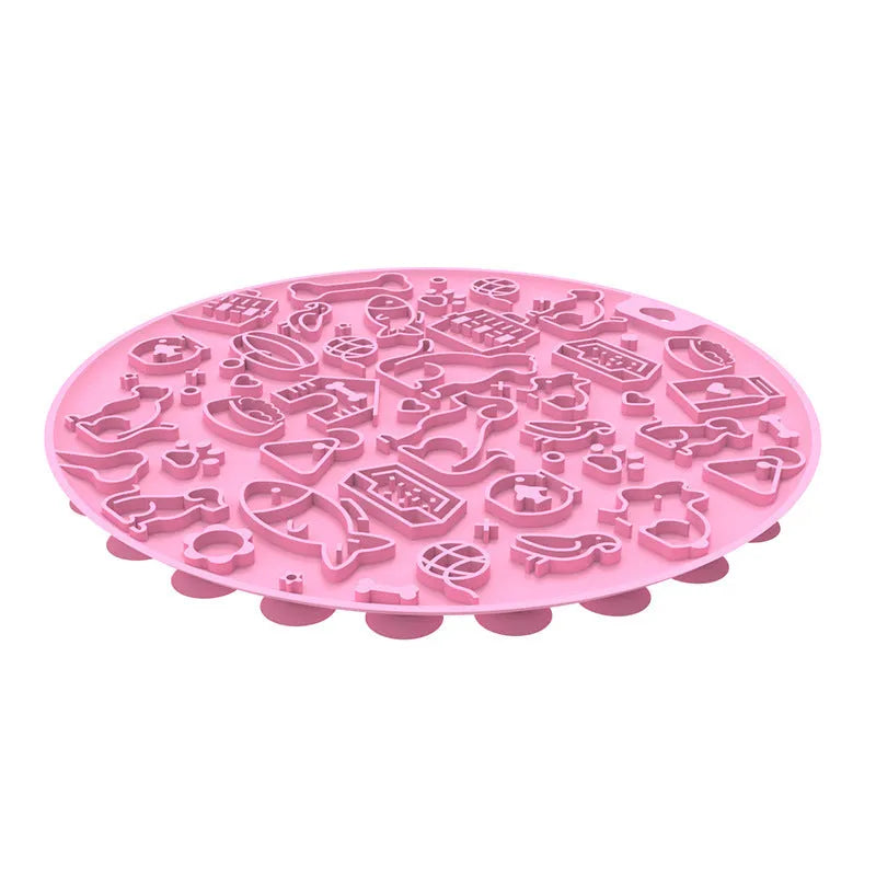 Round blue silicone pet lick mat with suction cup base on a kitchen counter