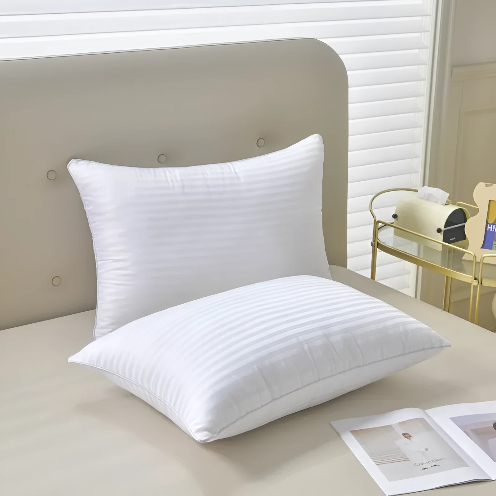 White cotton satin stripe pillow with feather cotton fill showing three size options
