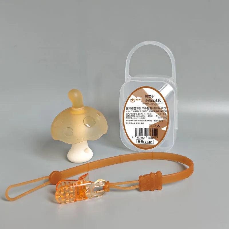 Small mushroom-shaped silicone chew gum with transparent chain attachment in pink colour