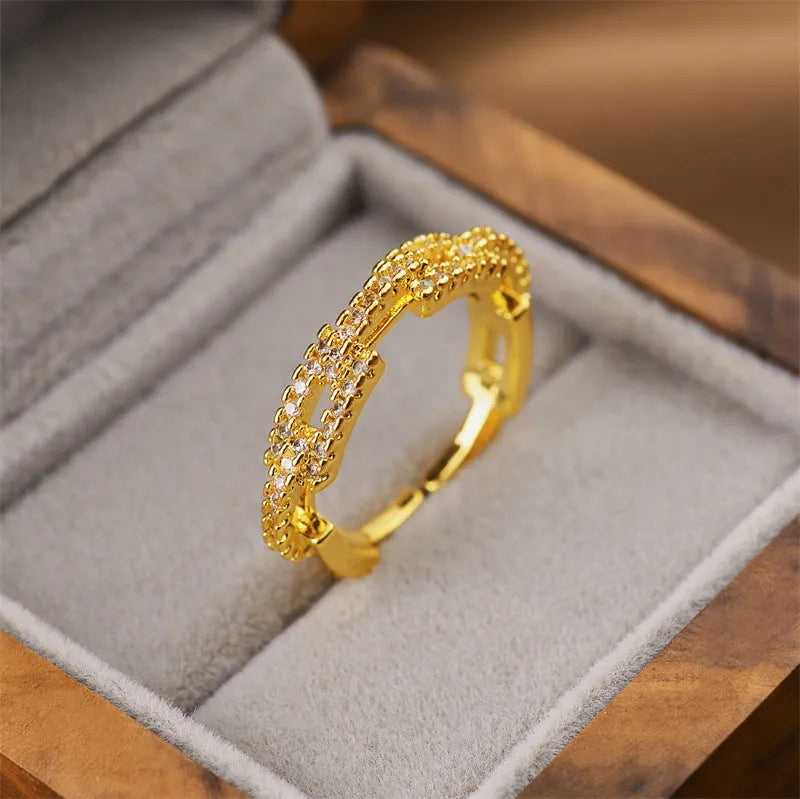 Korean women's open geometric ring with electroplated gold finish on copper