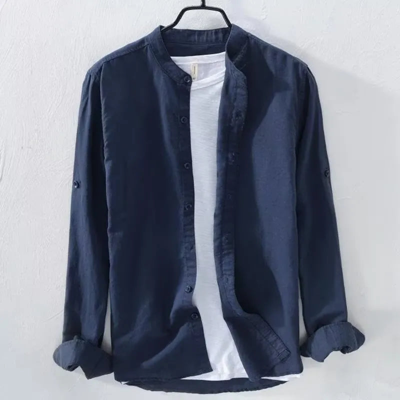 Loose fit long sleeve cotton linen shirt in solid dark blue colour displayed flat showing casual style