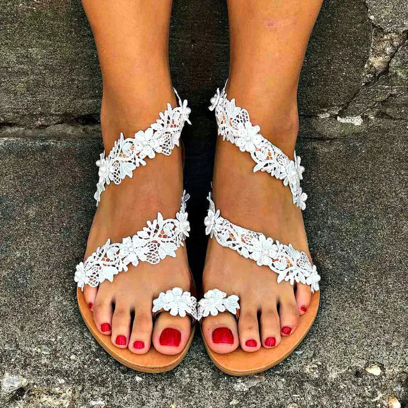 White women's flat sandals with rhinestone floral decoration and round toe slip-on design