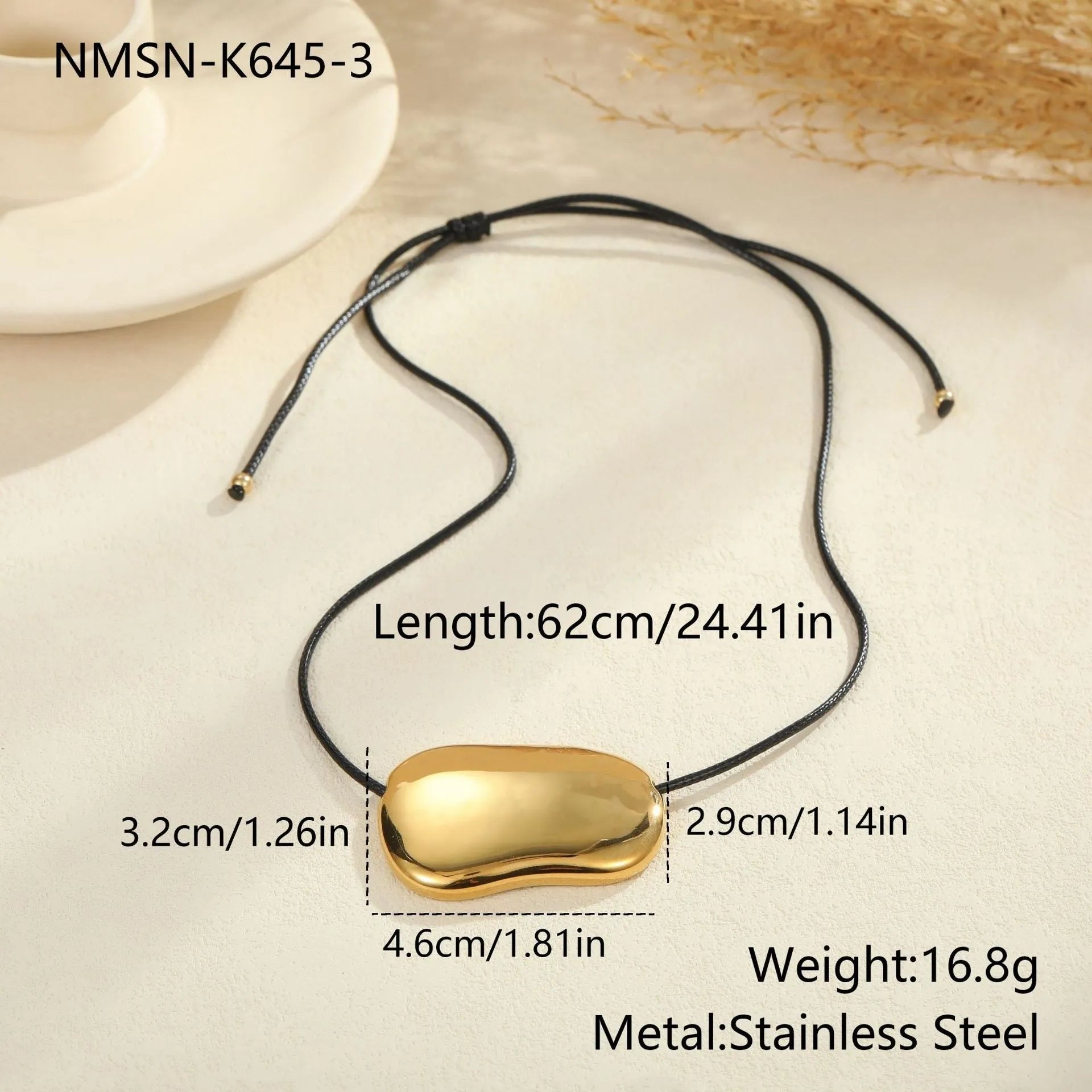 Stainless steel geometric pendant necklace on a black rope-style chain with an adjustable 41-50cm length.