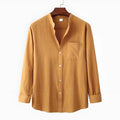 Brown men's slim fit long sleeve shirt and casual trousers set on a hanger.