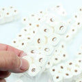 Small paper model of a tissue roll for dollhouse play, measuring 30mm by 15mm by 80mm.