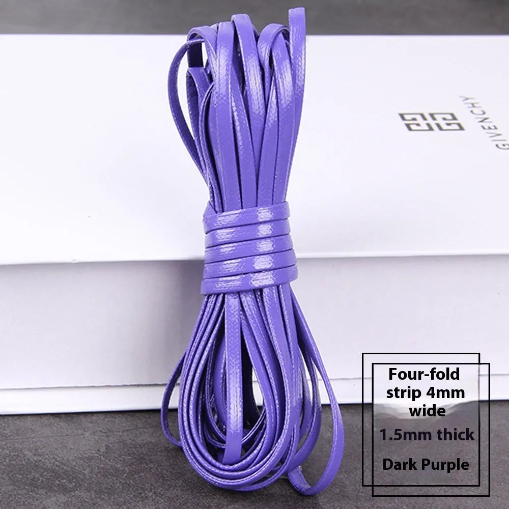 Coils of PU leather craft cord in multiple colours including black, red, blue, and beige