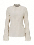 Black long sleeve round neck top with lantern sleeves and slim fit silhouette