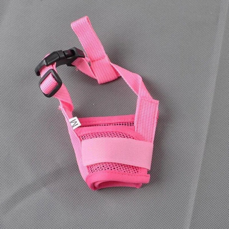 Adjustable plastic dog muzzle in assorted colours on a size chart showing measurements from 12cm to 34cm.