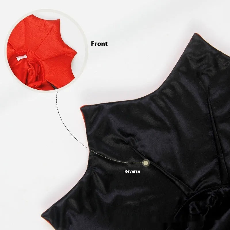 Black and red polyester Halloween costume for a dog or cat on a hanger.