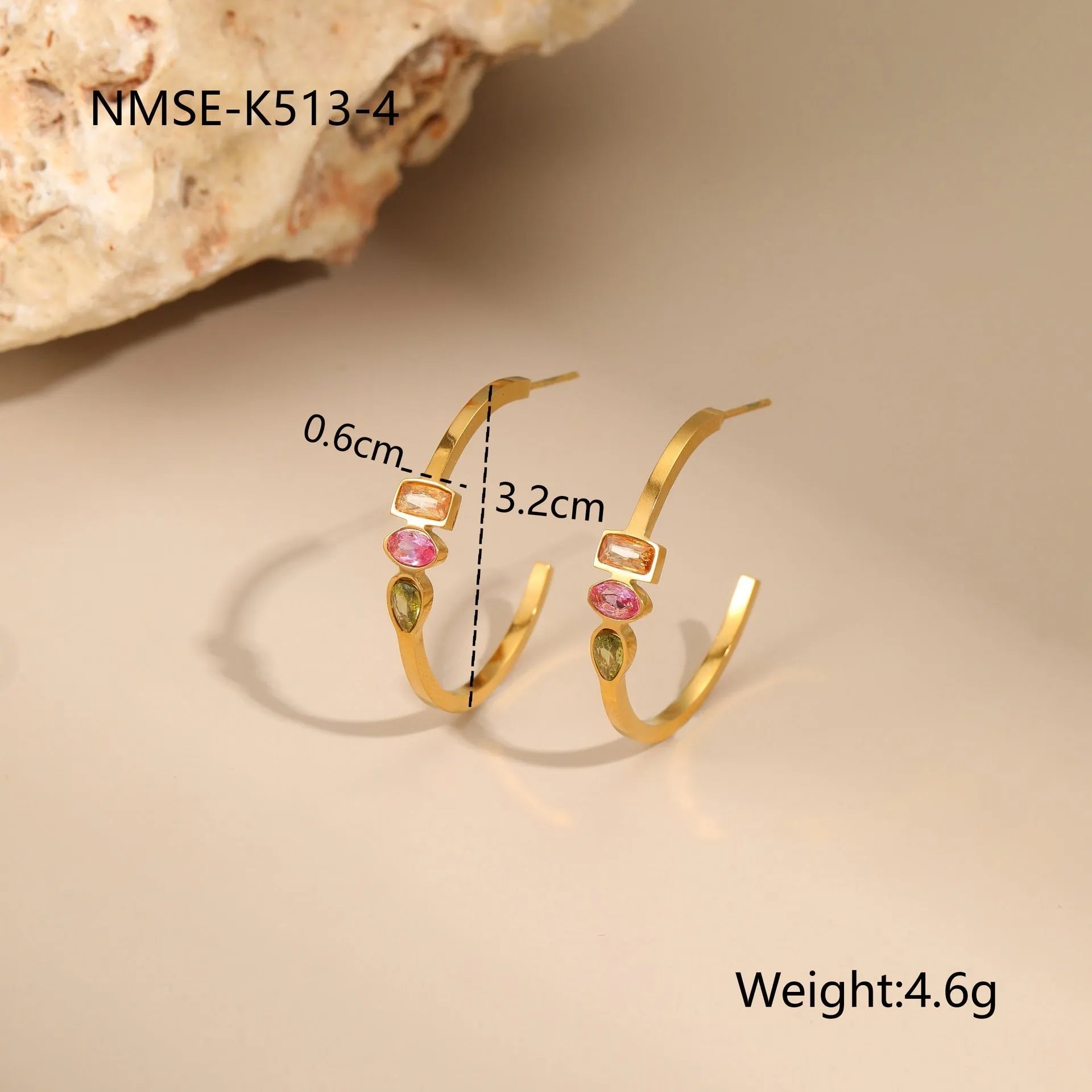 Geometric gold plated jewellery set showing necklace, ring, and earrings with chain-style design