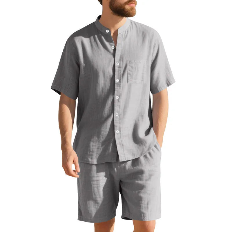 Men's light blue short-sleeve linen shirt and matching shorts, a casual two-piece summer suit set.
