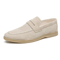 Men's beige leather slip-on shoes with round toe and rubber sole