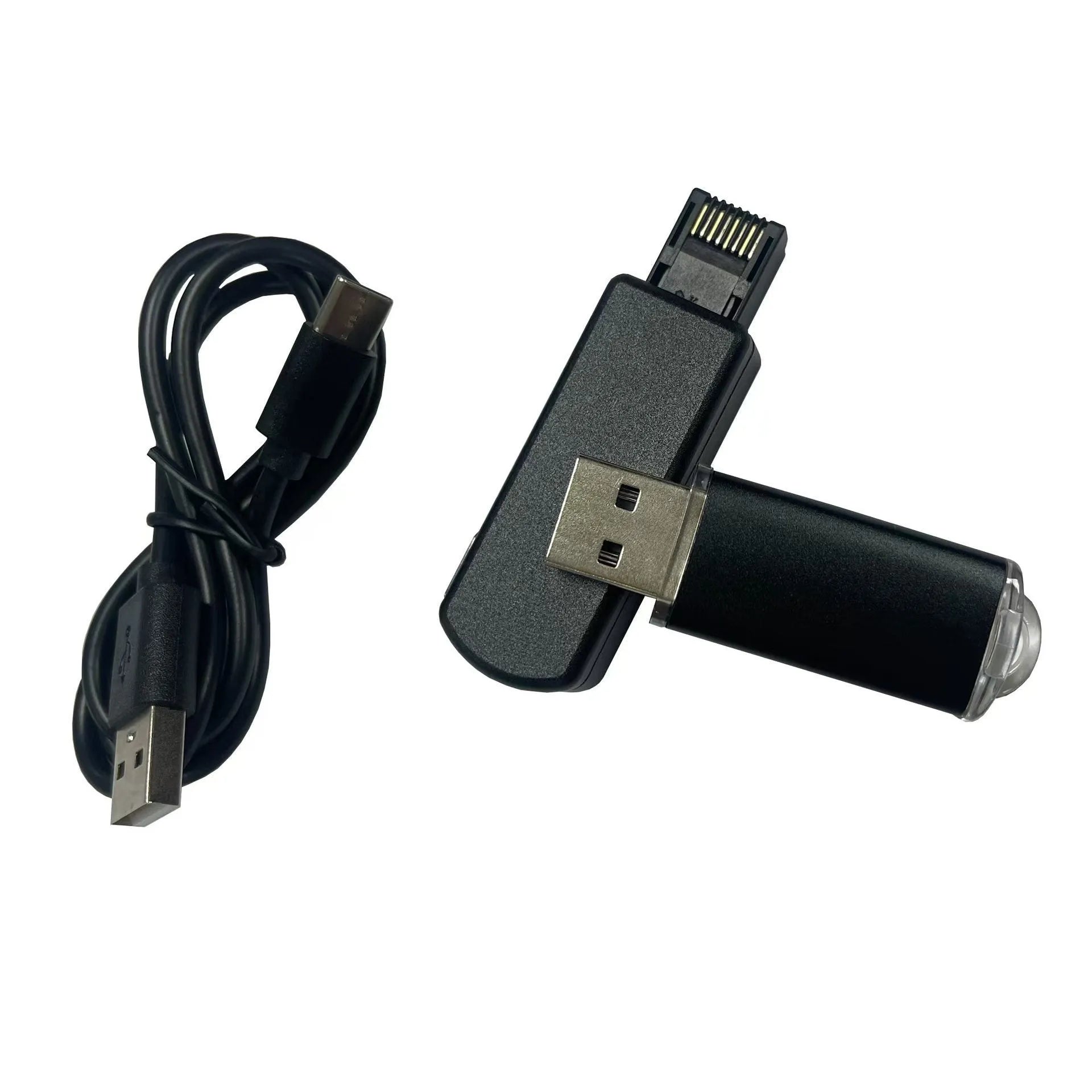 Black JB Tool USB host adapter for PlayStation with Ethernet port, shown with data cable and manual.